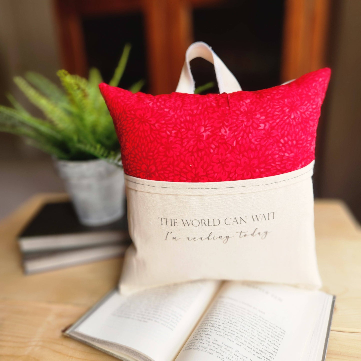 The world can wait... Reading Pillow, red batik
